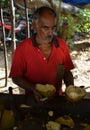 Man Selling Coconuts