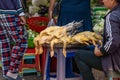 Man selling ducks on a street market