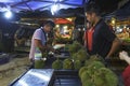 Man selling duran fruit at PJ Pasar Malam