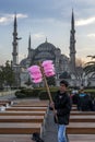 A man selling fairy floss in Sultanahmet in Istanbul in Turkey.