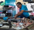 Man Selling Fish At Market In Faro Portugal