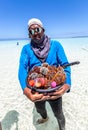 Man selling fresh seafood in Philippines