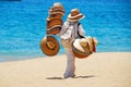 Man Selling Hats on Beach Royalty Free Stock Photo