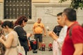 Man selling musicians' statues in a street in Sevilla, Spain