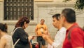 Man selling musicians' statues in a street in Sevilla, Spain