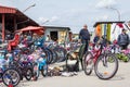 Man selling new bicycles on a bike shop on the Subotica market, also refereed as Buvlak.