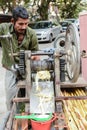 Man selling sugarcane juice