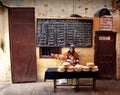 Man selling typical arabian bread in a market of Morocco. Royalty Free Stock Photo