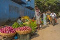 A man selling vegetables on the local Indian market