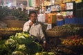 Man selling vegetables in Srimangal, Bangladesh