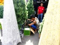 A man sells decorative plants and flowers and christmas decors in Dapitan Market