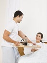 Man Serving Breakfast Tray to Woman Royalty Free Stock Photo