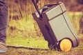 Man serving caravan, go with tank toilet cassette to dump station Royalty Free Stock Photo