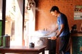 A man serving Momo at one shop, the South Asian or Tibetan dumpling