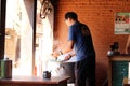 A man serving Momo at one shop, the South Asian or Tibetan dumpling