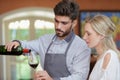 man serving woman glass wine Royalty Free Stock Photo