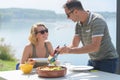 Man serving woman salad Royalty Free Stock Photo