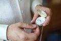 Man set a pocket watch clock in the time change color photo. Royalty Free Stock Photo