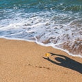 Man shadow on the hot sea sand Royalty Free Stock Photo