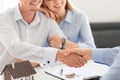 Man shaking hands with real estate agent in office Royalty Free Stock Photo