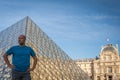 Man shares the enthusiasm from a visit to the Louvre in Paris