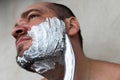 Man shaves his beard with a knife Royalty Free Stock Photo