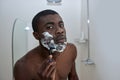 Man shaving cream razor portrait Royalty Free Stock Photo