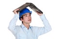 Man sheltering under laptop Royalty Free Stock Photo