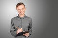 Man in shirt making notes in his pad Royalty Free Stock Photo