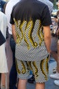 Man with shirt and shorts with yellow octopus tentacles before Palm Angels fashion show, Milan