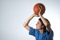 Man Shooting a Basketball - Horizontal Royalty Free Stock Photo
