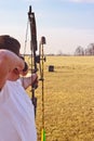 Man shooting bow Royalty Free Stock Photo