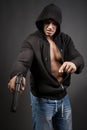 Man shooting gun isolated on gray Royalty Free Stock Photo