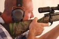 Man shooting rifle. Royalty Free Stock Photo