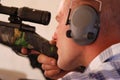 Man shooting rifle. Royalty Free Stock Photo