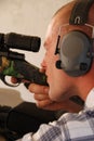 Man shooting rifle. Royalty Free Stock Photo