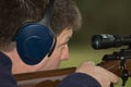 Man shooting rifle close-up Royalty Free Stock Photo