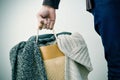 Man with a shopping bag with clothes Royalty Free Stock Photo