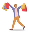 Man is standing with shopping bags. Young fashion shopper guy picks up multi-colored packages