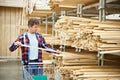 Man shopping for timber in shop Royalty Free Stock Photo