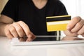 Man holding tablet pc and credit card indoor, Shopping online Royalty Free Stock Photo