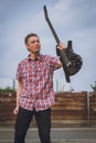 Man in short sleeve shirt holding electric guitar Royalty Free Stock Photo