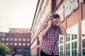 Man in short sleeve shirt talking on phone Royalty Free Stock Photo