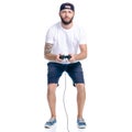 Man in shorts and cap with gamepad in hand