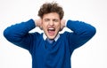 Man shouting and covering his ears Royalty Free Stock Photo