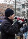 Man Shouts Conspiracy Theories into a Bullhorn at an Armed Demonstration
