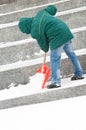 Man shoveling winter snow