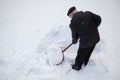 Man shovelling fresh snow Royalty Free Stock Photo