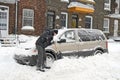 Man shovelling and removing snow