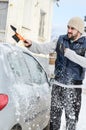 Man shovelling and removing snow